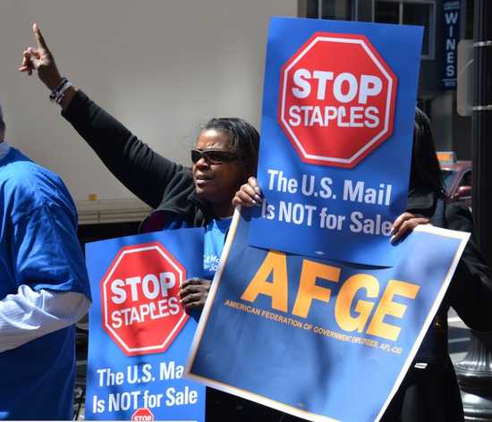 “Americans spend $103 billion a year on predatory lenders. Postal banking could change that.”